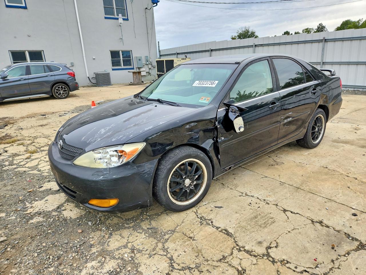 Photo of the 2004 TOYOTA CAMRY LE