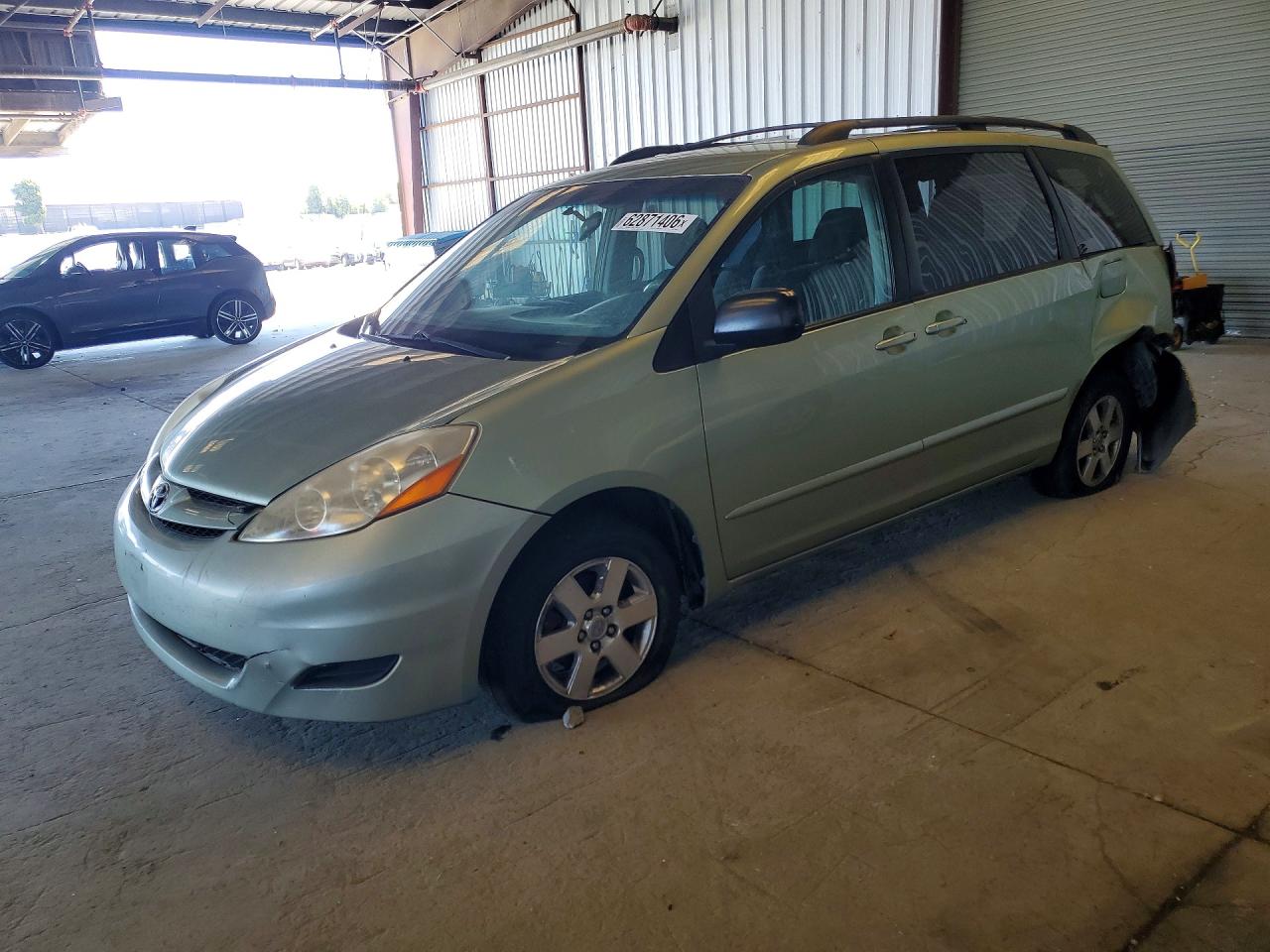 Photo of the 2009 TOYOTA SIENNA LE 7-PASSENGER