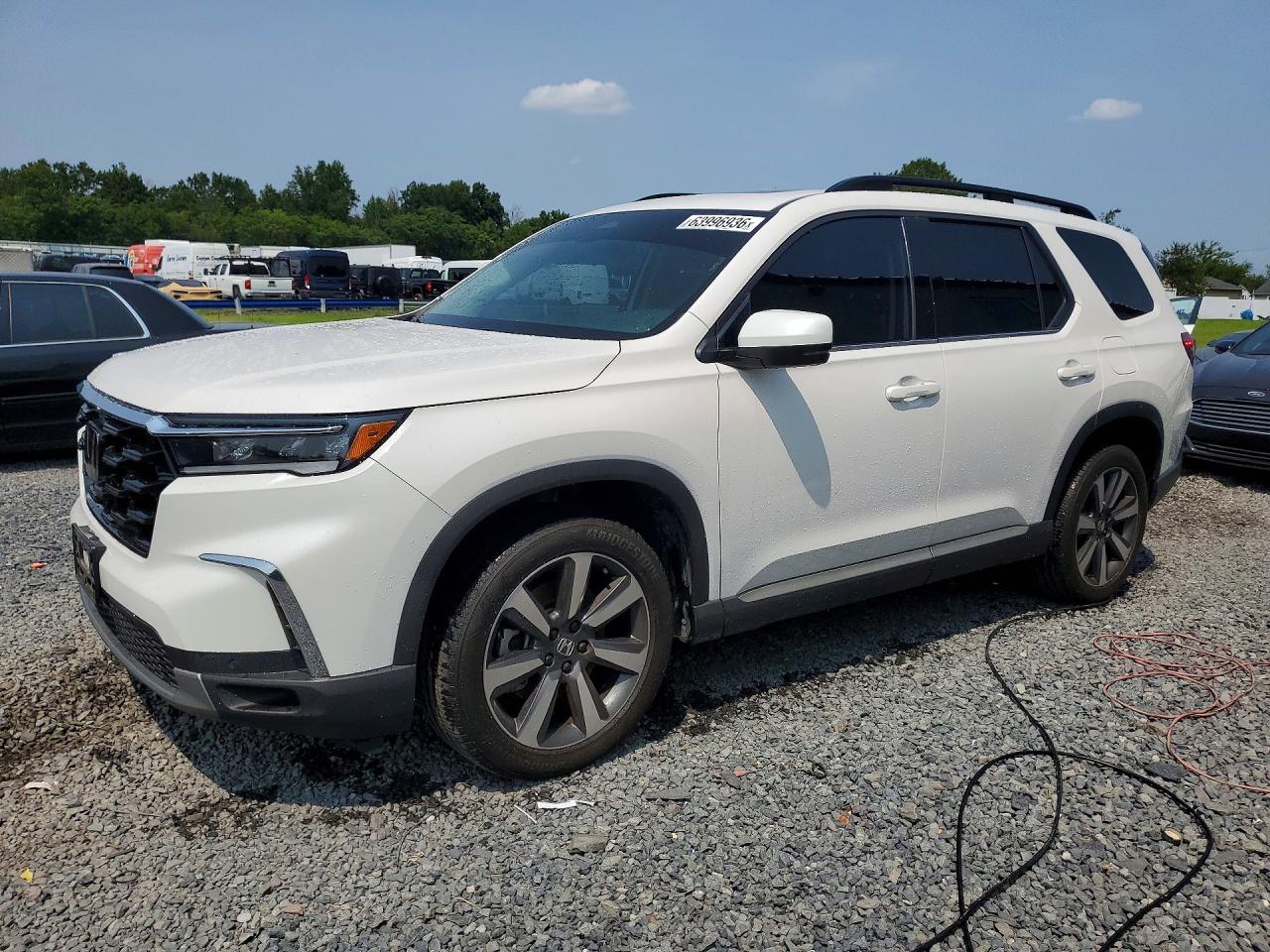 Photo of the 2025 HONDA PILOT TOURING